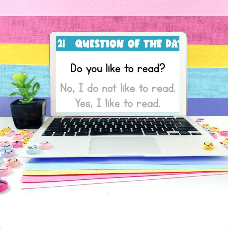 Question of the day: Do you like to read? displayed on a laptop computer screen upon a desk
