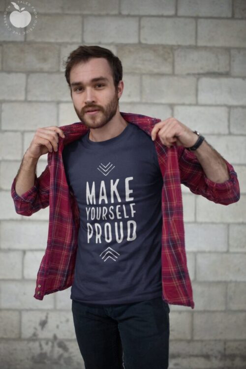 Make Yourself Proud text on tee on man with flannel