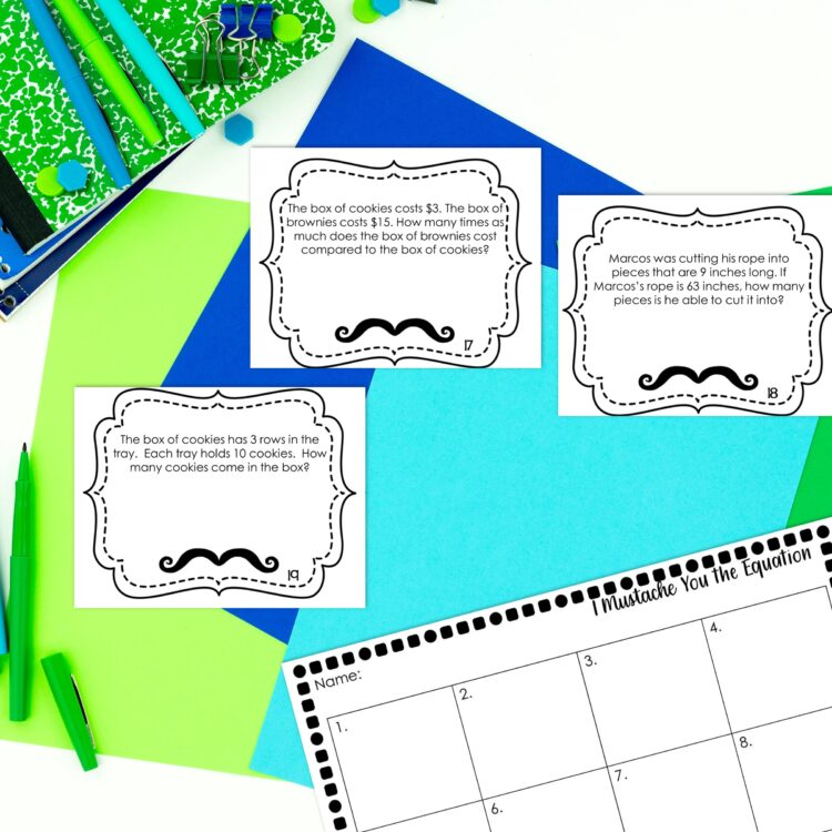Multiplication & Division Word Problem Types task cards with recording sheet laying along green and blue paper with a green Flair pen