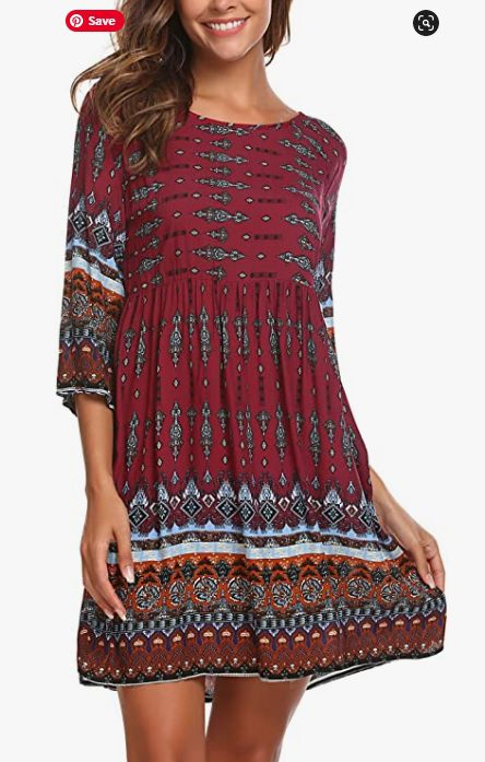 Maroon knee length boho dress that has an empire waist. 3/4 sleeves, and colorful print.